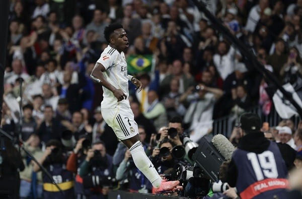 Vinicius Jr. Rescues Real Madrid in Derby Against Atlético